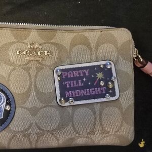 Coach Tan Wristlet with Embellishments